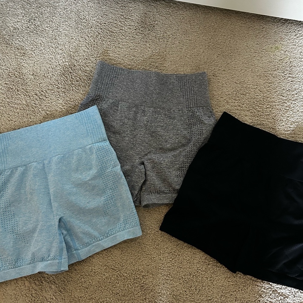 Pack of biker shorts, size medium, blue, gray, and black